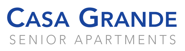 A sign that says "CASA GRANDE SENIOR APARTMENTS".